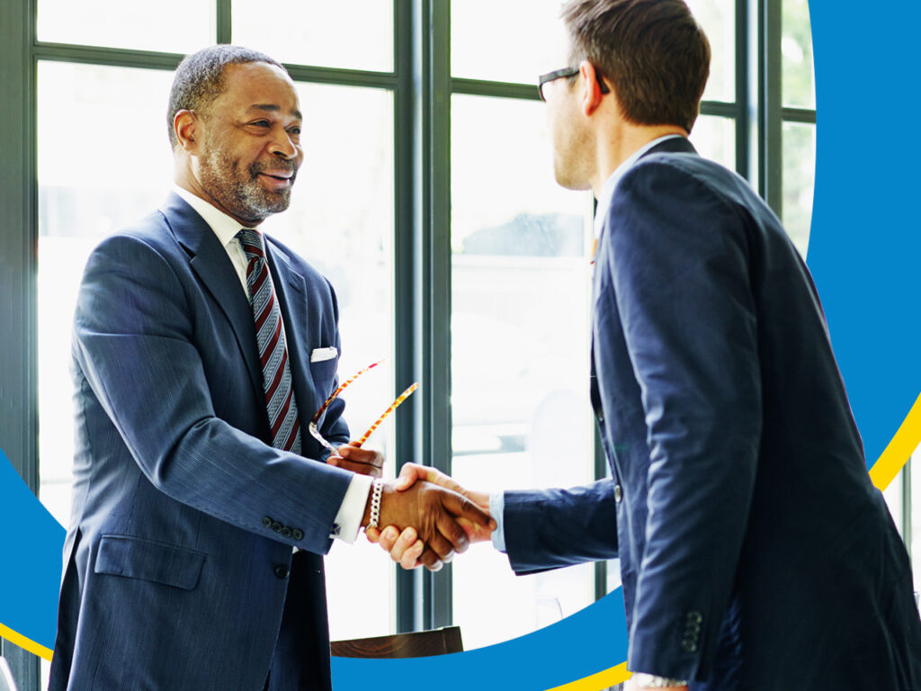 Two business men shaking hands